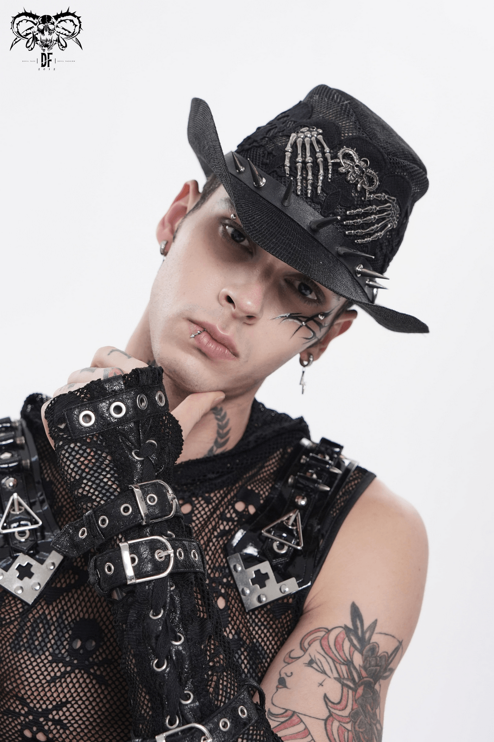 Dark Gothic Wide Brim Hat with Skull Lace and Spike Trim worn by a model showcasing gothic fashion.