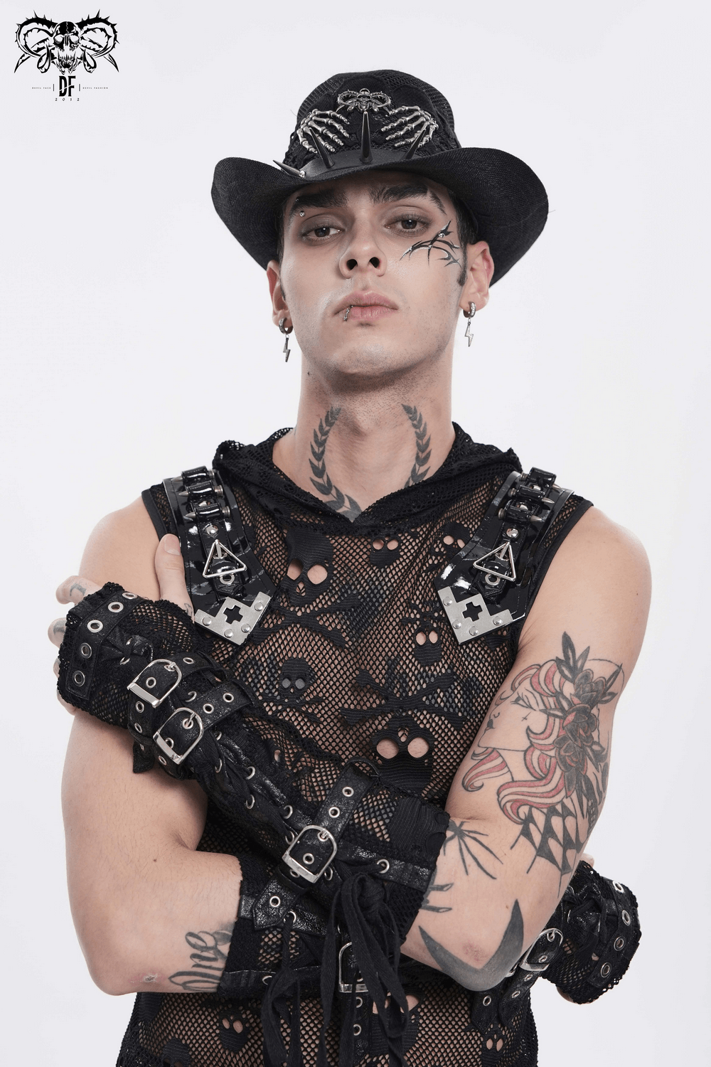 A model showcasing a Dark Gothic Wide Brim Hat with Skull Lace and Spike Trim, styled with punk attire.