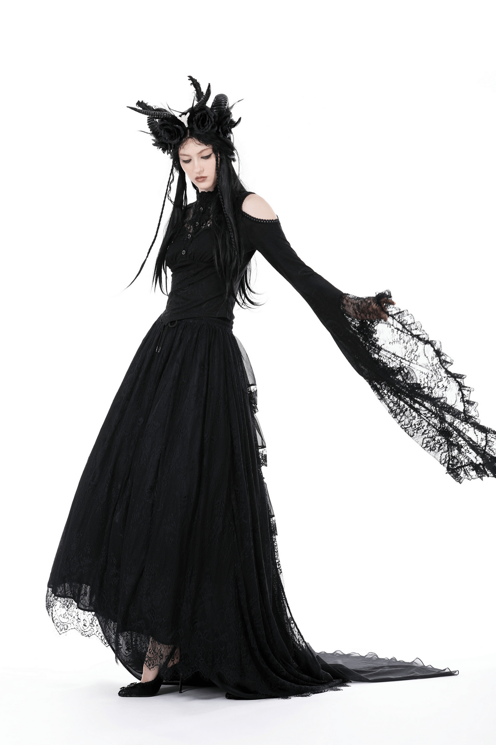 Gothic Victorian lace off-shoulder black top with flared sleeves and dramatic skirt, styled for dark elegance.
