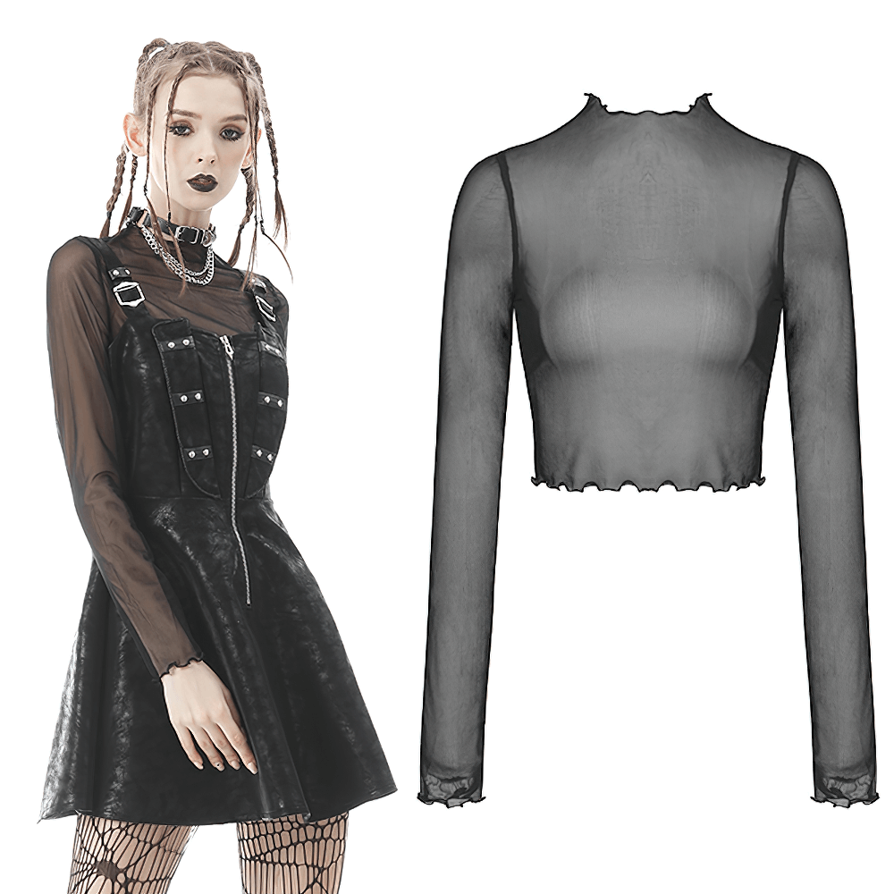 Model wearing a dark mesh fishnet crop top with long sleeves, styled with a black dress and edgy accessories.