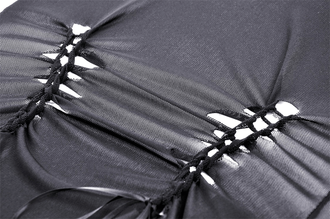 Close-up of dark mesh fabric showcasing unique lacing details for gothic off-the-shoulder top.