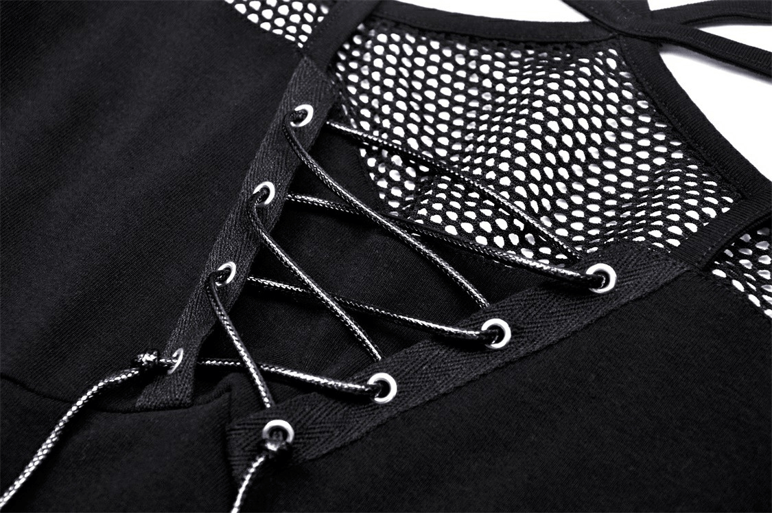 Close-up of black lace-up detail on a punk gothic top with mesh sleeves, showcasing edgy fashion design.