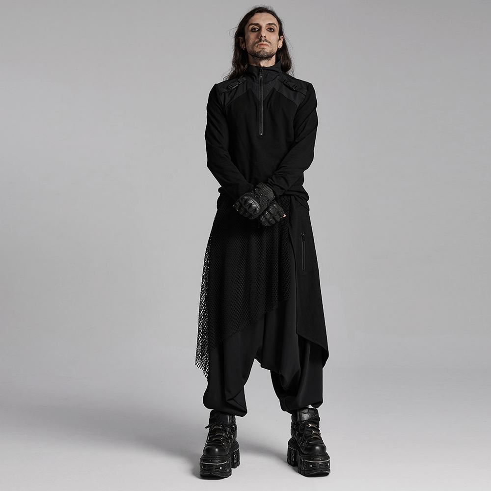 Dark punk model wears loose fit harem pants with mesh layers and edgy style, perfect for streetwear fashion.