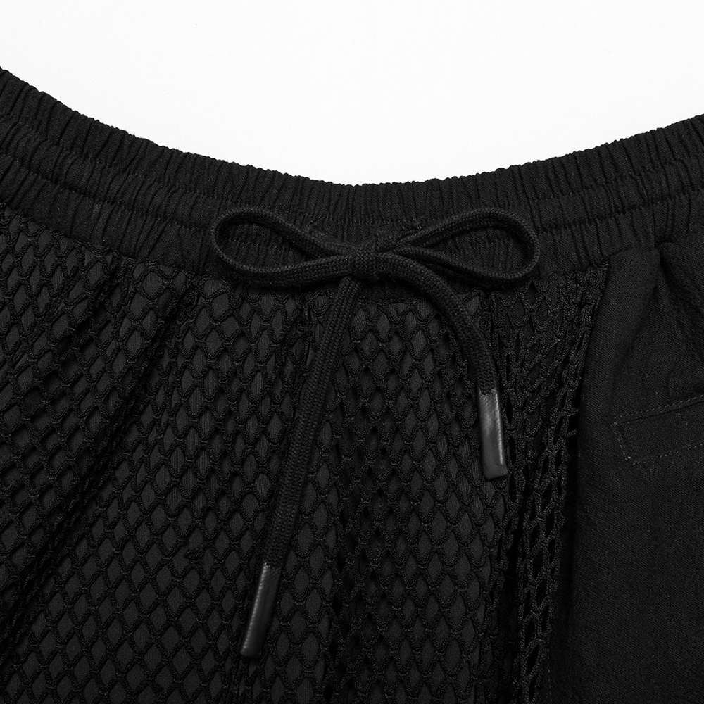 Close-up of black mesh waistband with adjustable drawstring on dark punk harem pants. Perfect for streetwear style.