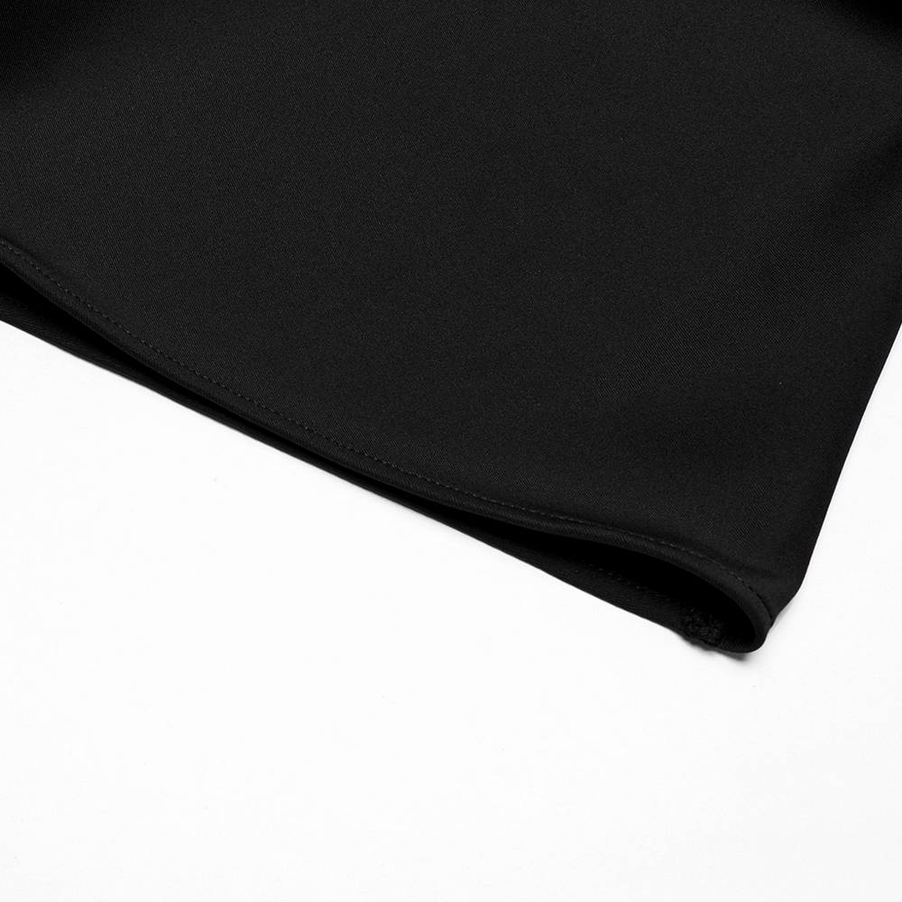 Close-up of the hem of dark punk loose fit harem pants showcasing smooth black fabric and clean stitching.