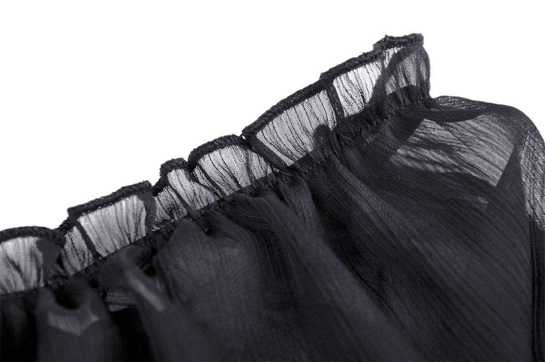 Close-up of sheer black fabric with ruffled detailing, perfect for gothic or punk fashion.