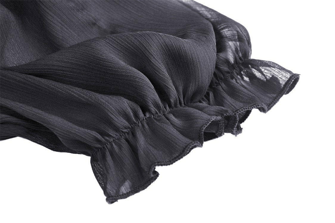 Close-up of the ruffled cuff detailing on a dark chiffon fabric, adding elegant flair to a gothic top.