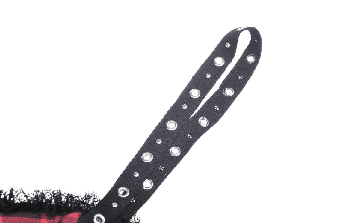 Close-up of adjustable strap with eyelets and lace from a Dark Punk Mini Dress in red and black plaid.