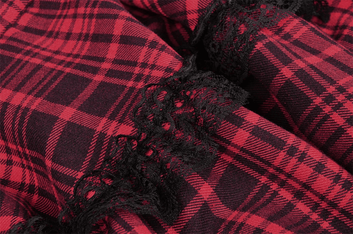 Close-up of red and black plaid fabric with black lace detailing, perfect for a punk rock mini dress.