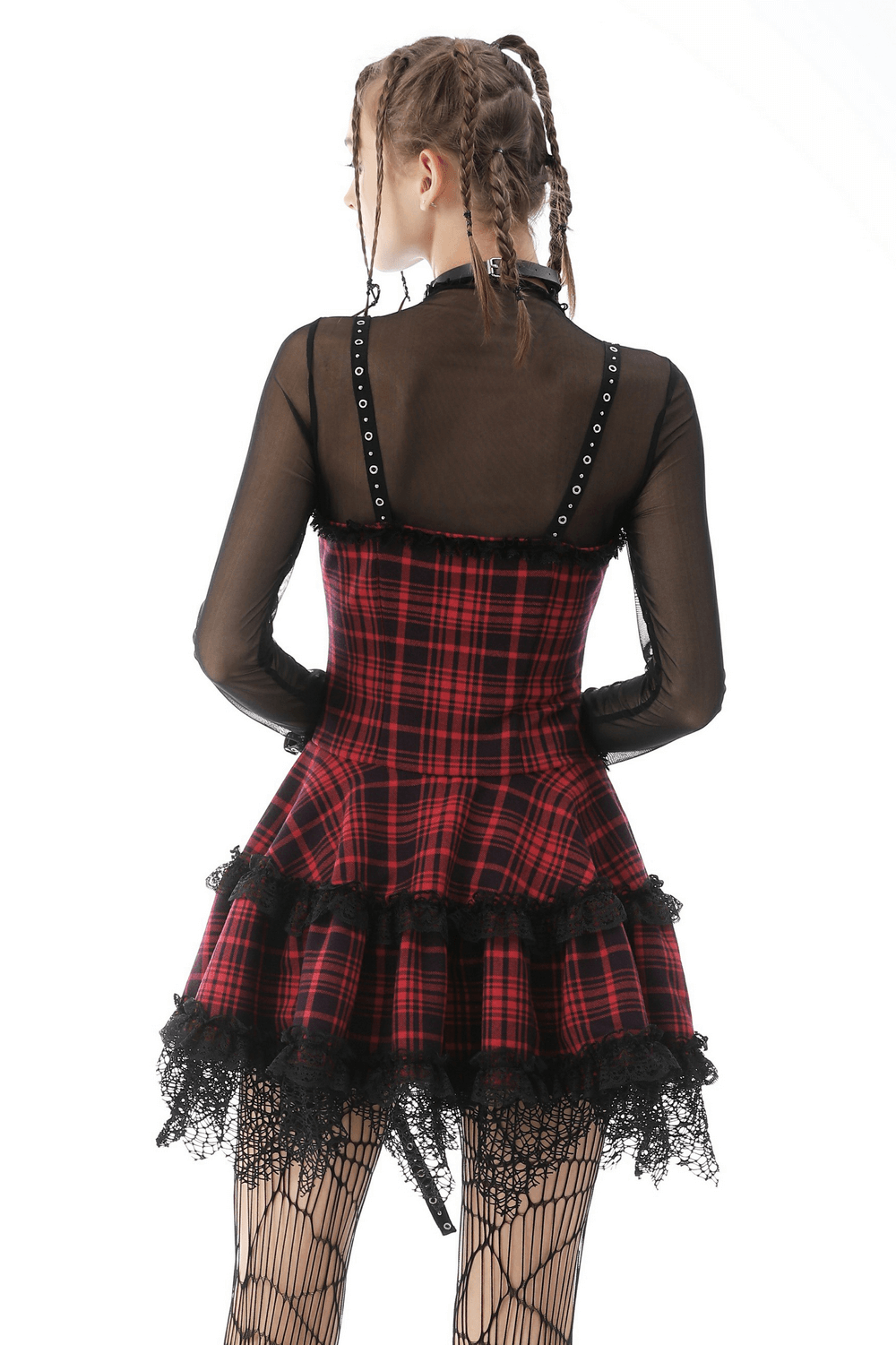 Back view of a red and black plaid mini dress with lace trim and black mesh top, showcasing punk style and edgy fashion.