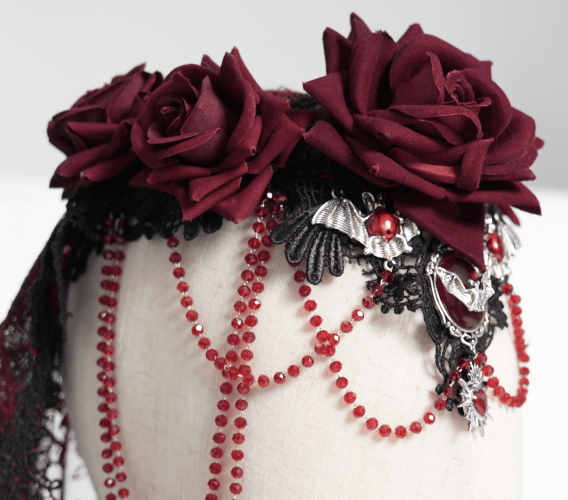 Gothic lace veil with wine red roses, beaded chains, and skull pendant, perfect for alternative and dramatic costumes.