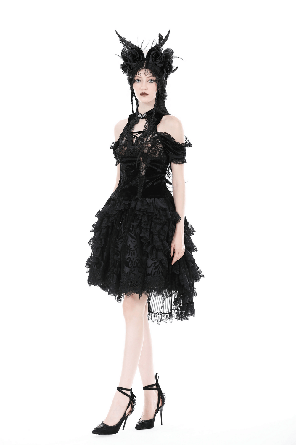 Gothic black lace dress with ruffles, creating a whimsical and bold dark romantic look.