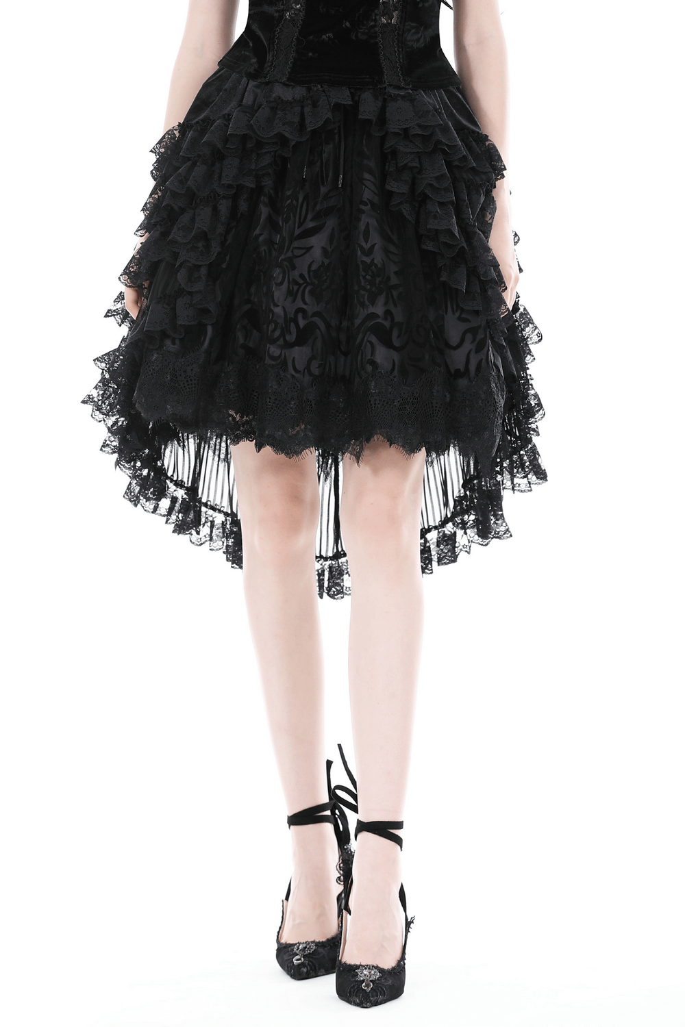 Dark romantic black lace high-low skirt with ruffles, perfect for gothic fashion lovers.