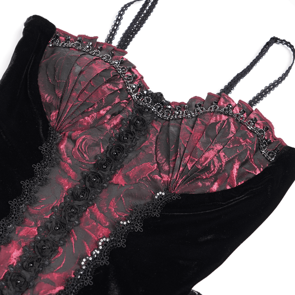 Close-up of black velvet corset with wine red floral detailing and lace trim, perfect for a gothic romantic gown.