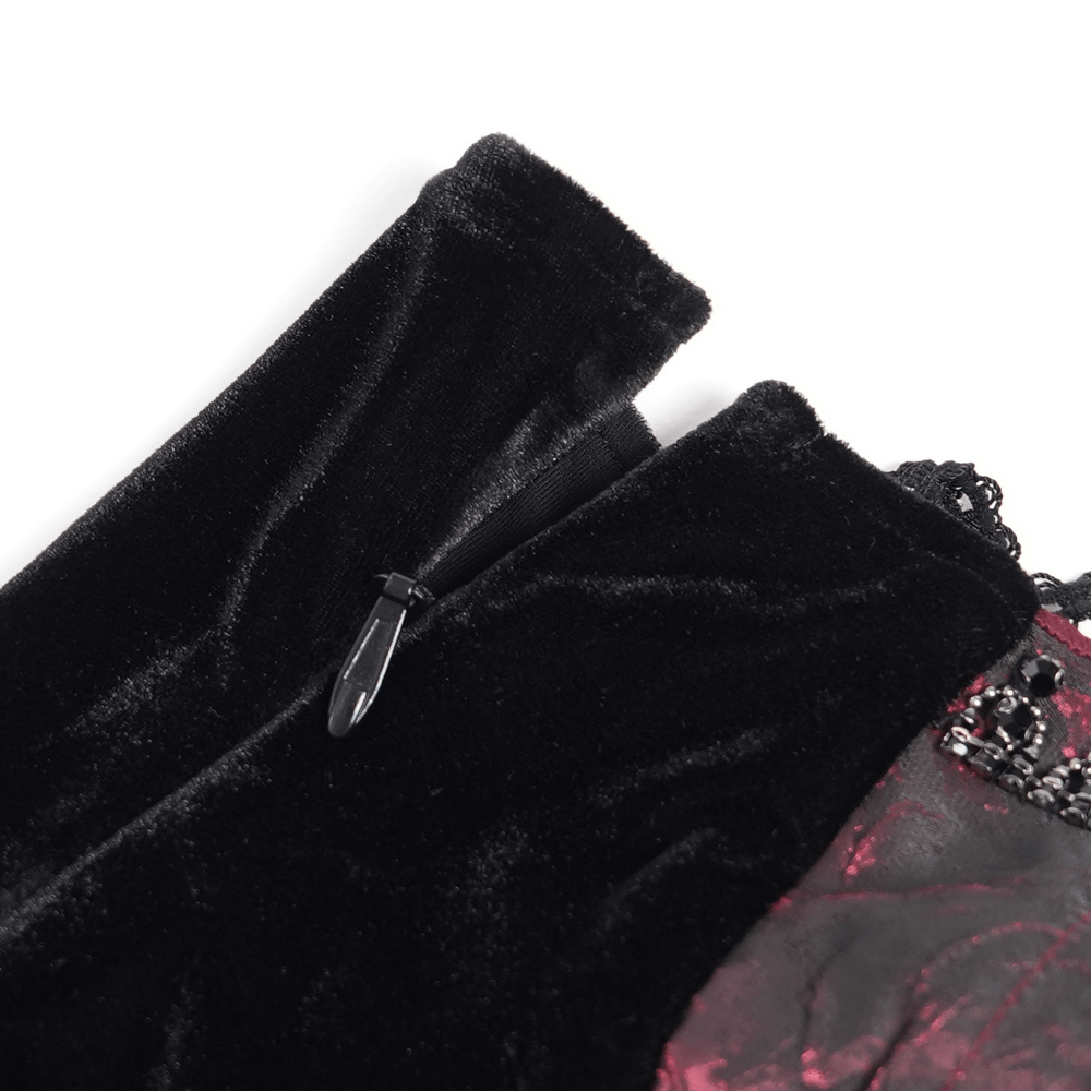 Close-up of dark velvet and lace details on gothic gown with corset back and zipper