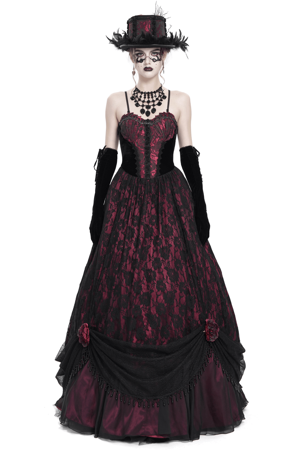 Dark romantic gothic gown with floral lace, velvet corset, and dramatic skirt adorned with rose appliqués.