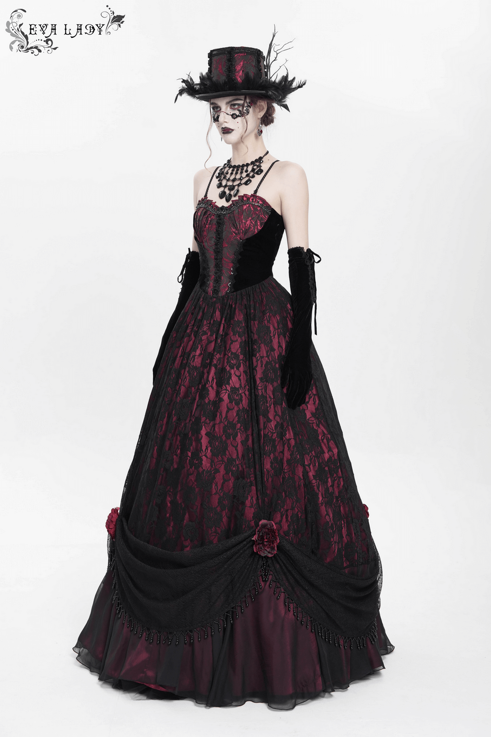 Dark romantic gothic gown featuring black lace and wine red corset with elegant floral details and a dramatic silhouette.