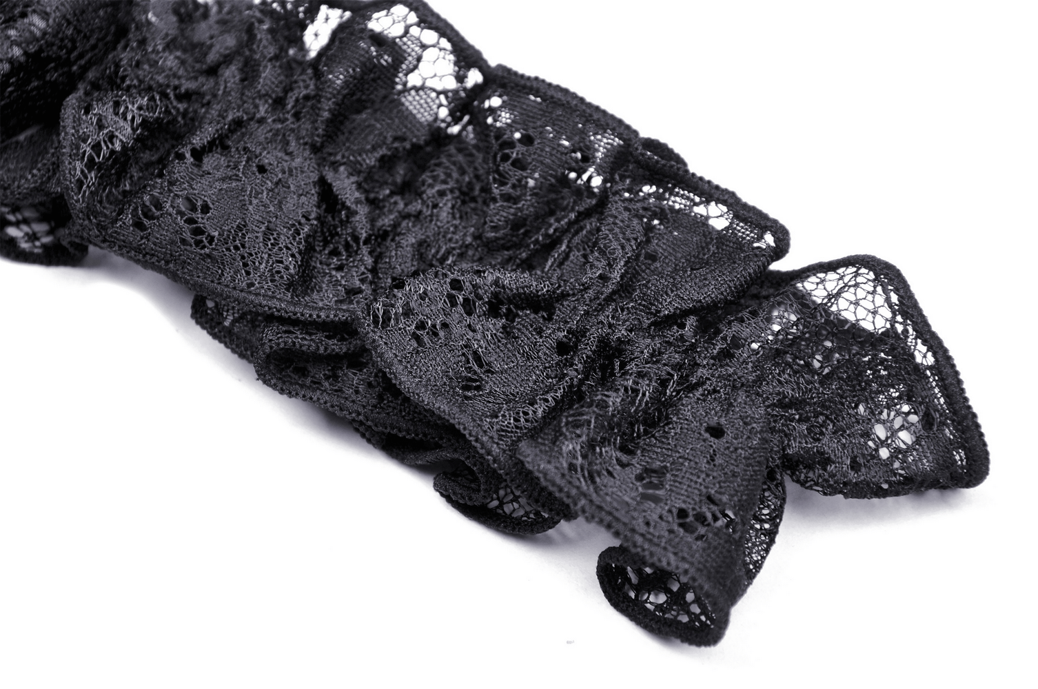 Intricate black lace detail showcasing romantic gothic elegance, perfect for accessories or dress embellishments.