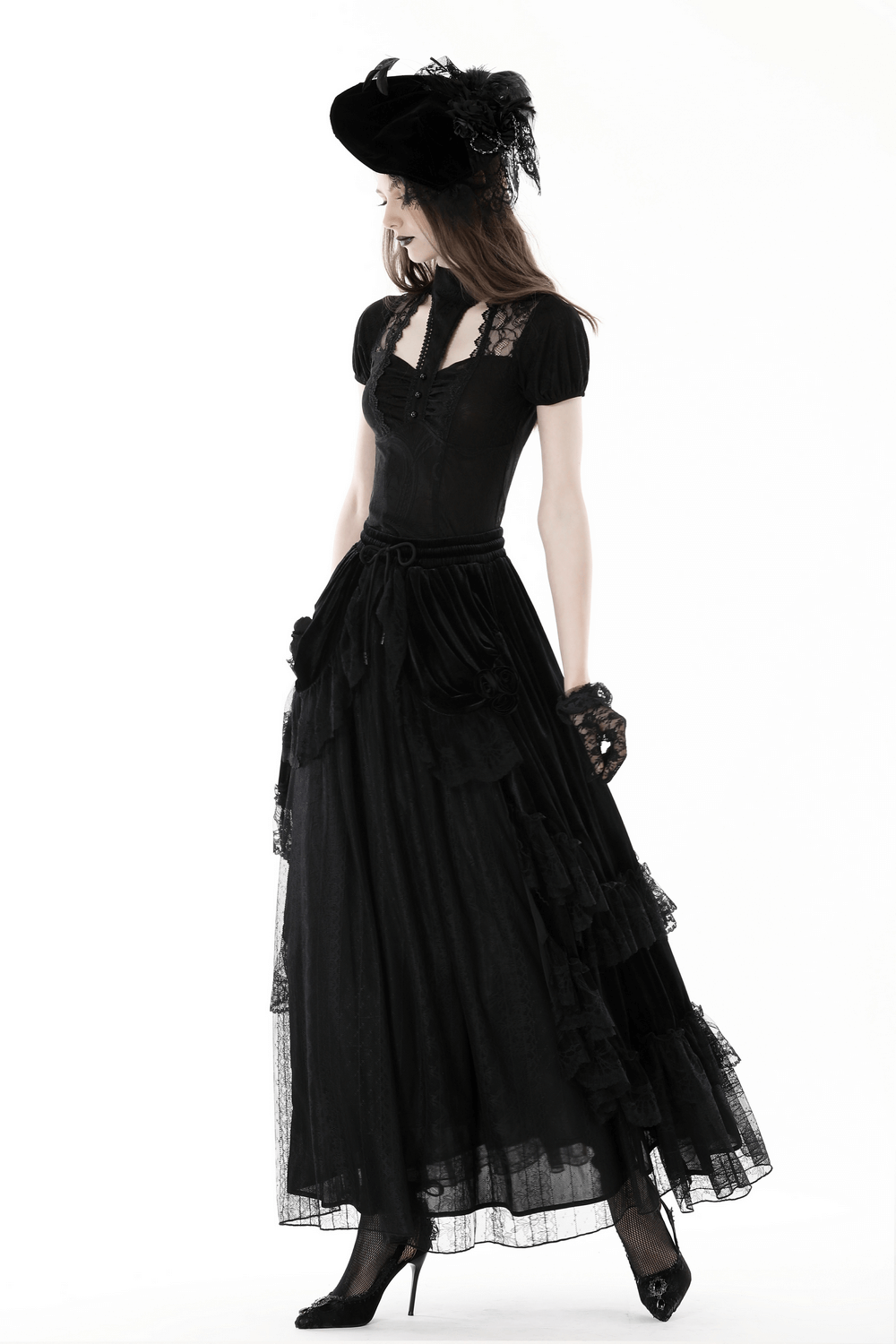 Elegant black gothic lace dress with puff sleeves and a stylish hat, perfect for dark romantic fashion.
