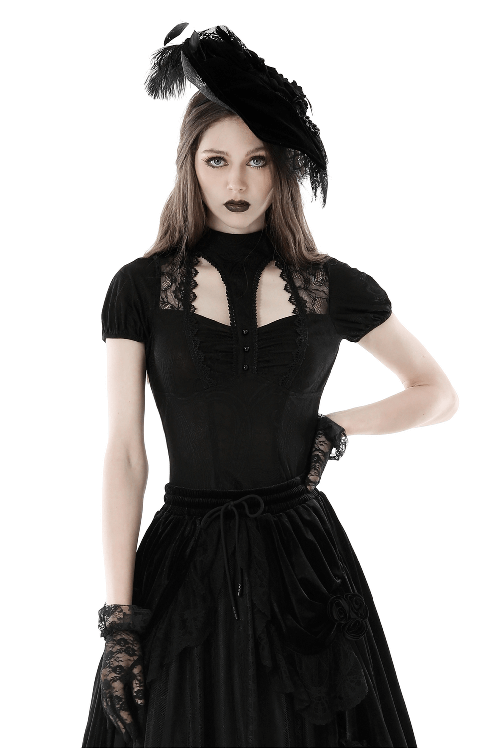 Dark romantic gothic lace top with short puff sleeves, paired with a stylish black skirt and hat.