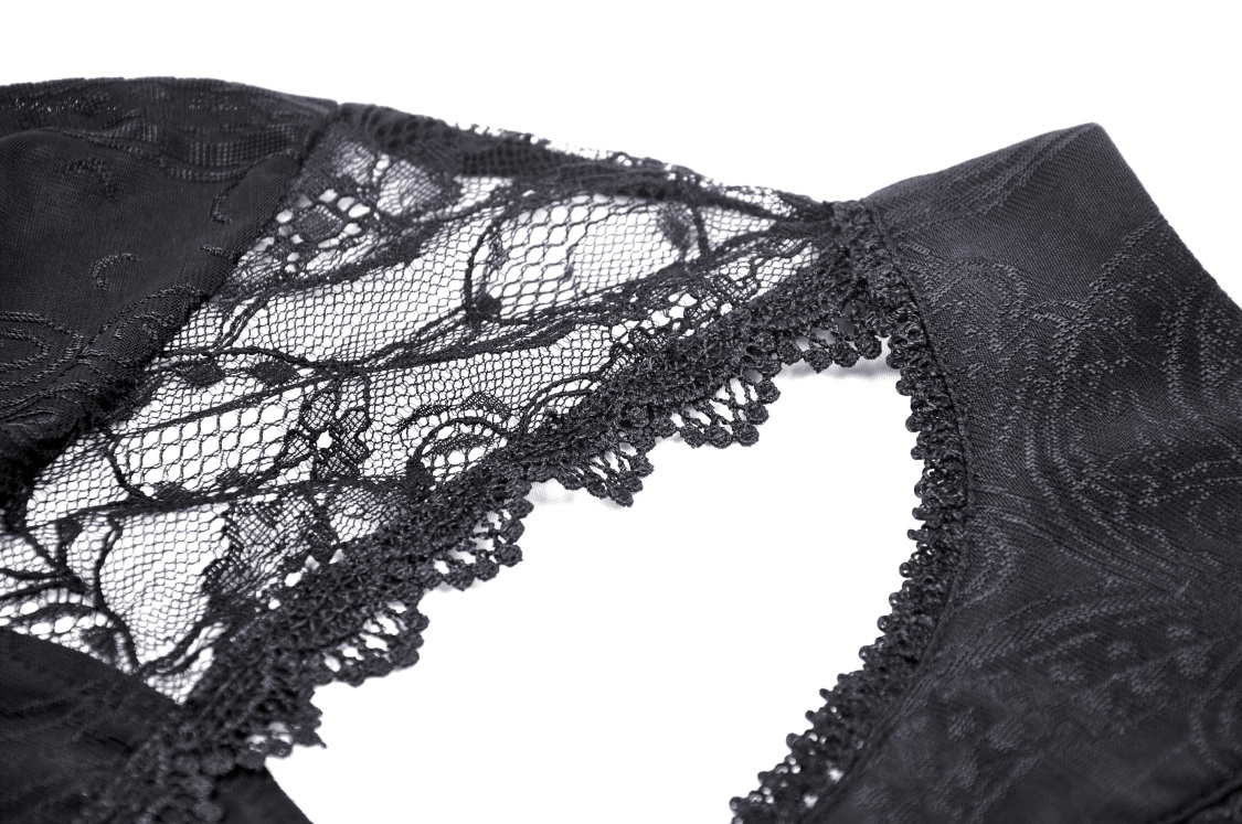 Detailed view of a gothic black lace top featuring a crescent moon cutout and intricate lace design.
