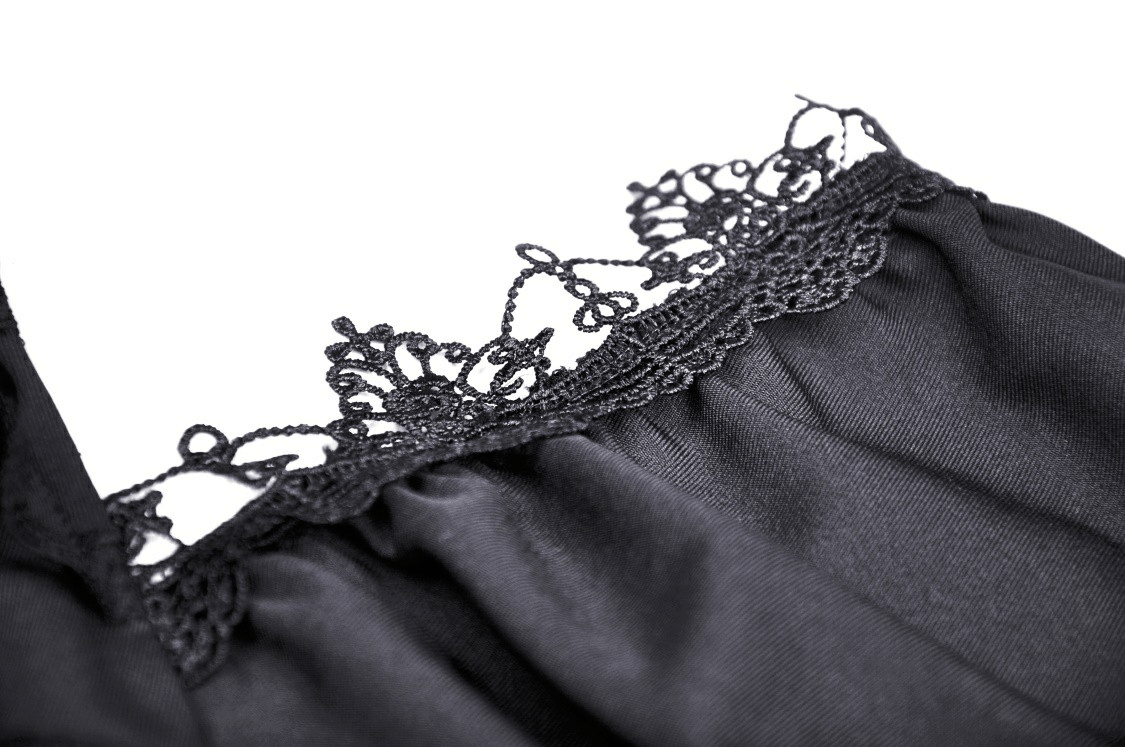Close-up of intricate lace detailing on a black gothic dress, showcasing elegant craftsmanship and romantic style.