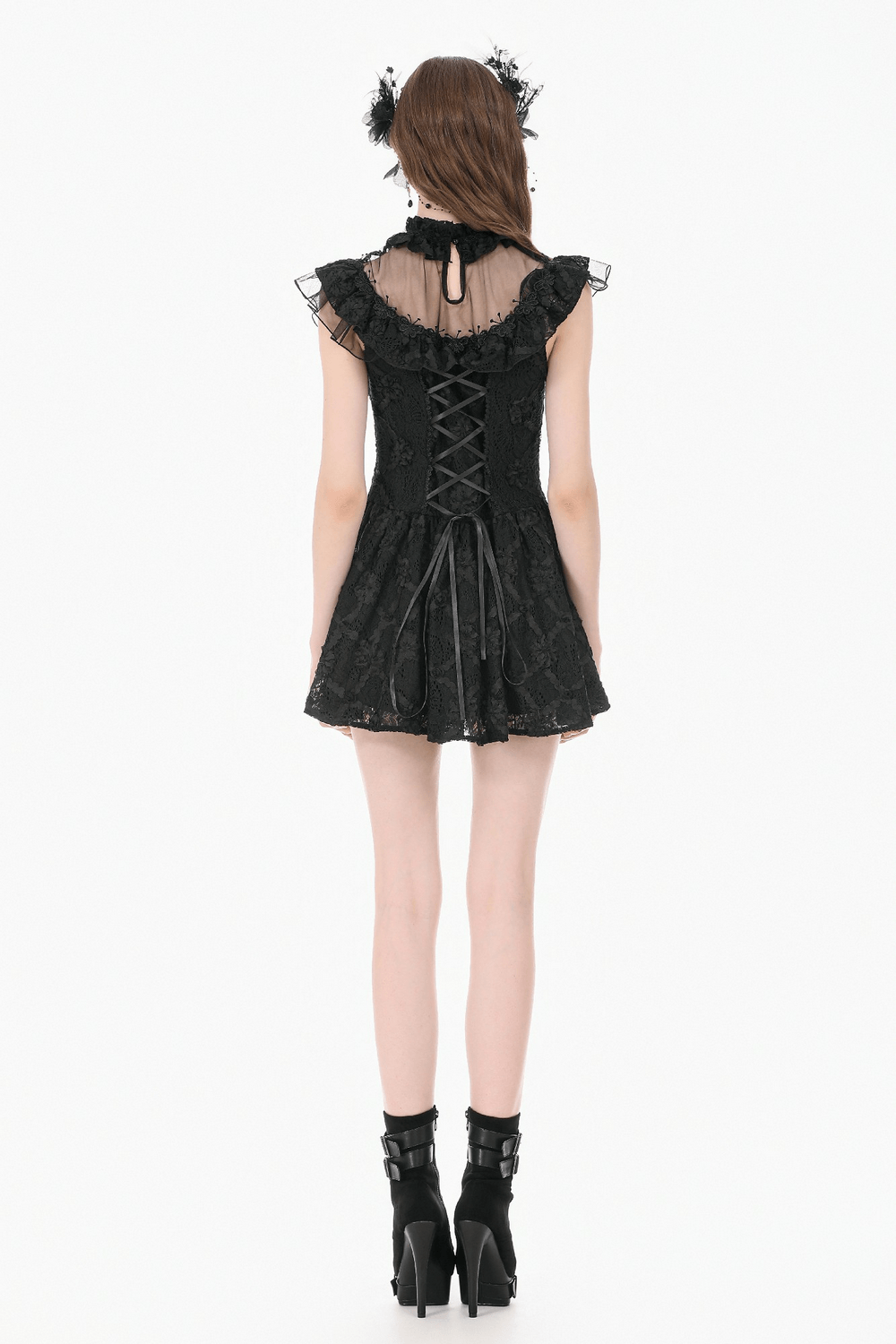 Back view of Dark Romantic Lace Mini Dress with Corset Waist and Cross showcasing lace details and corset lacing.
