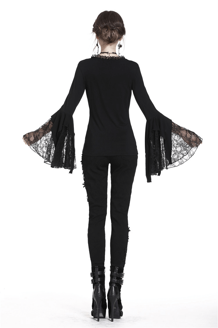 Back view of a dark romantic lace top with flared sleeves, perfect for a gothic look.