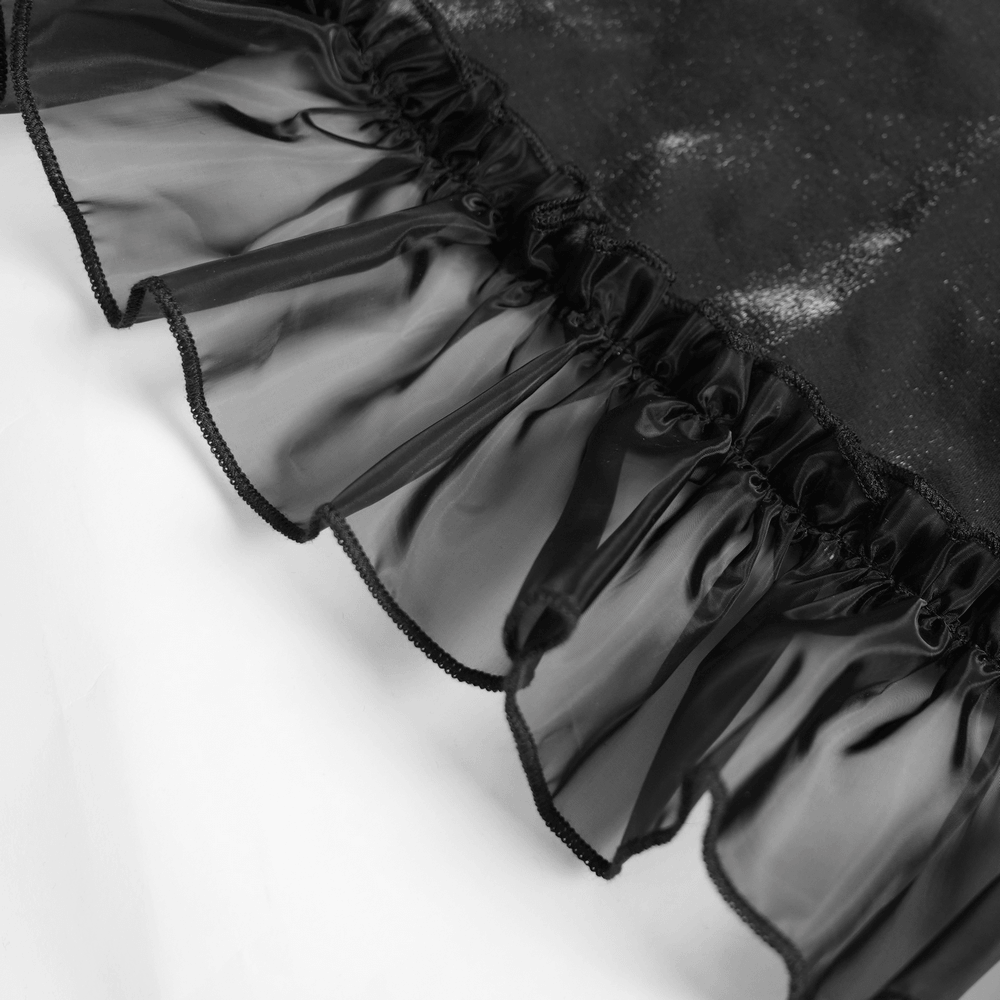 Close-up of the frill hem of the Dark Romantic Layered Velvet Lace Skirt with Chains, showcasing ruffled detailing.