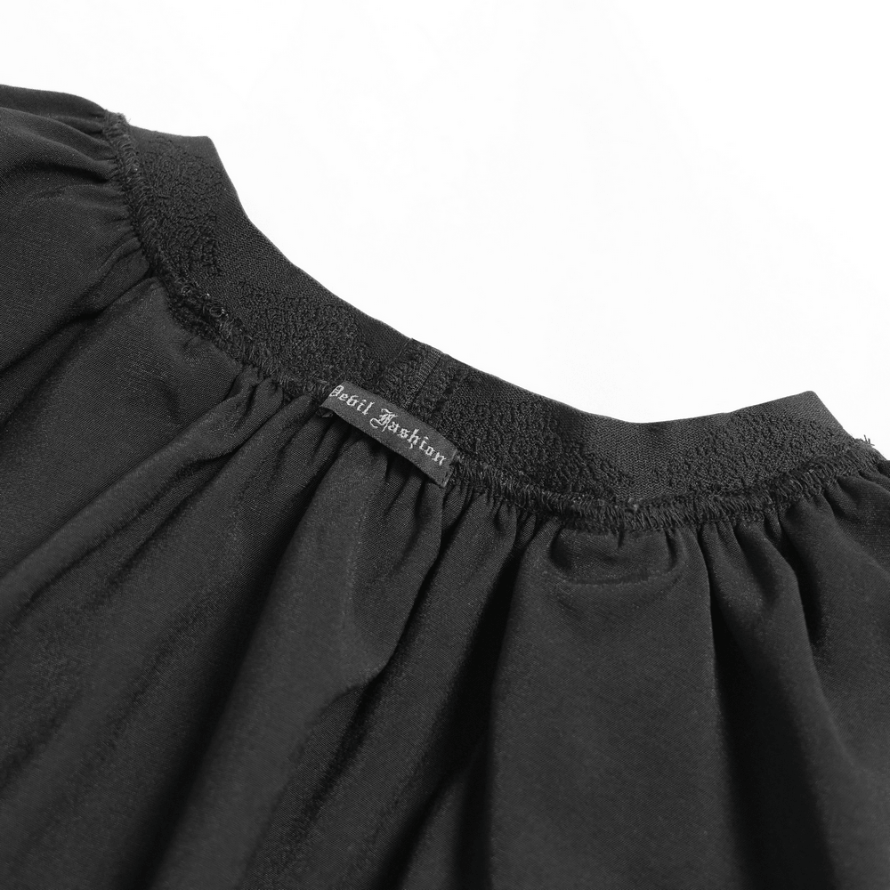 Dark Romantic Layered Velvet Lace Skirt with Chains close-up of label and gathered waistband detail.