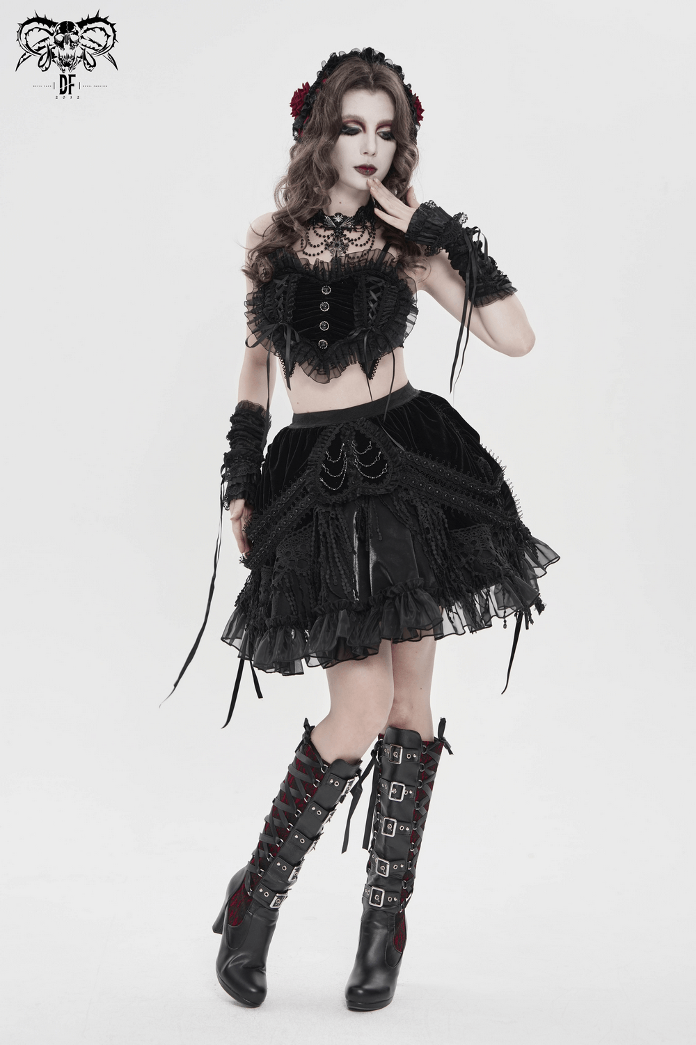 Dark Romantic Layered Velvet Lace Skirt with Chains worn by a model, featuring ruffles and gothic accessories.