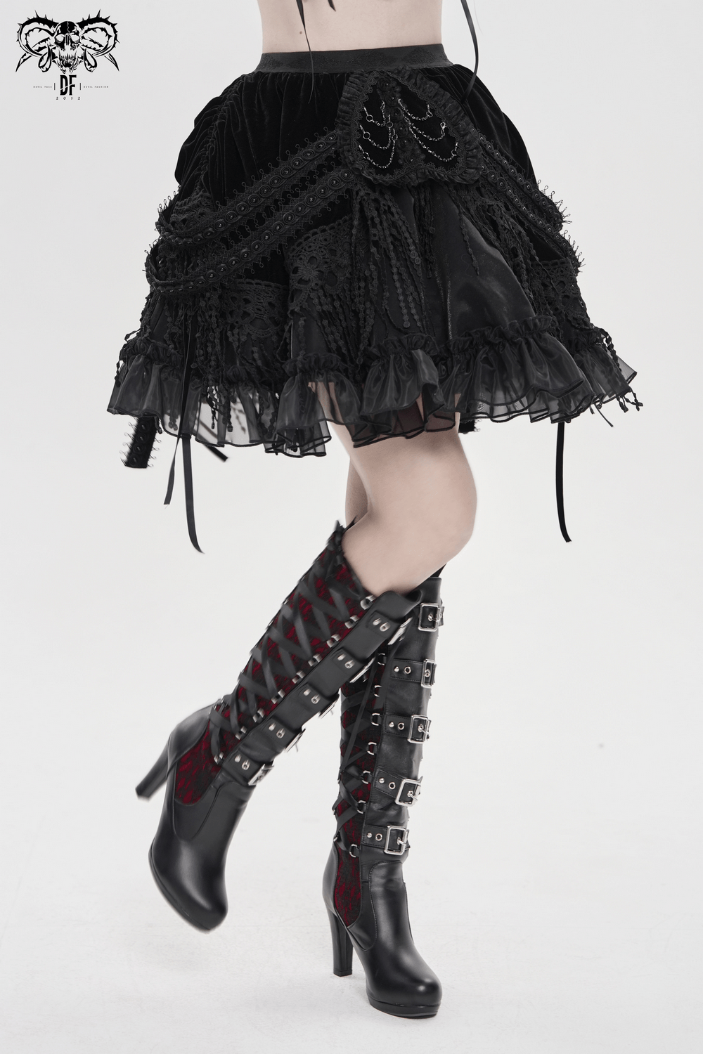 Dark Romantic Layered Velvet Lace Skirt with Chains styled with black knee-high boots.