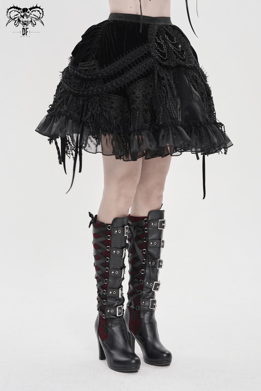 Dark Romantic Layered Velvet Lace Skirt with Chains showcased with edgy black lace-up boots.