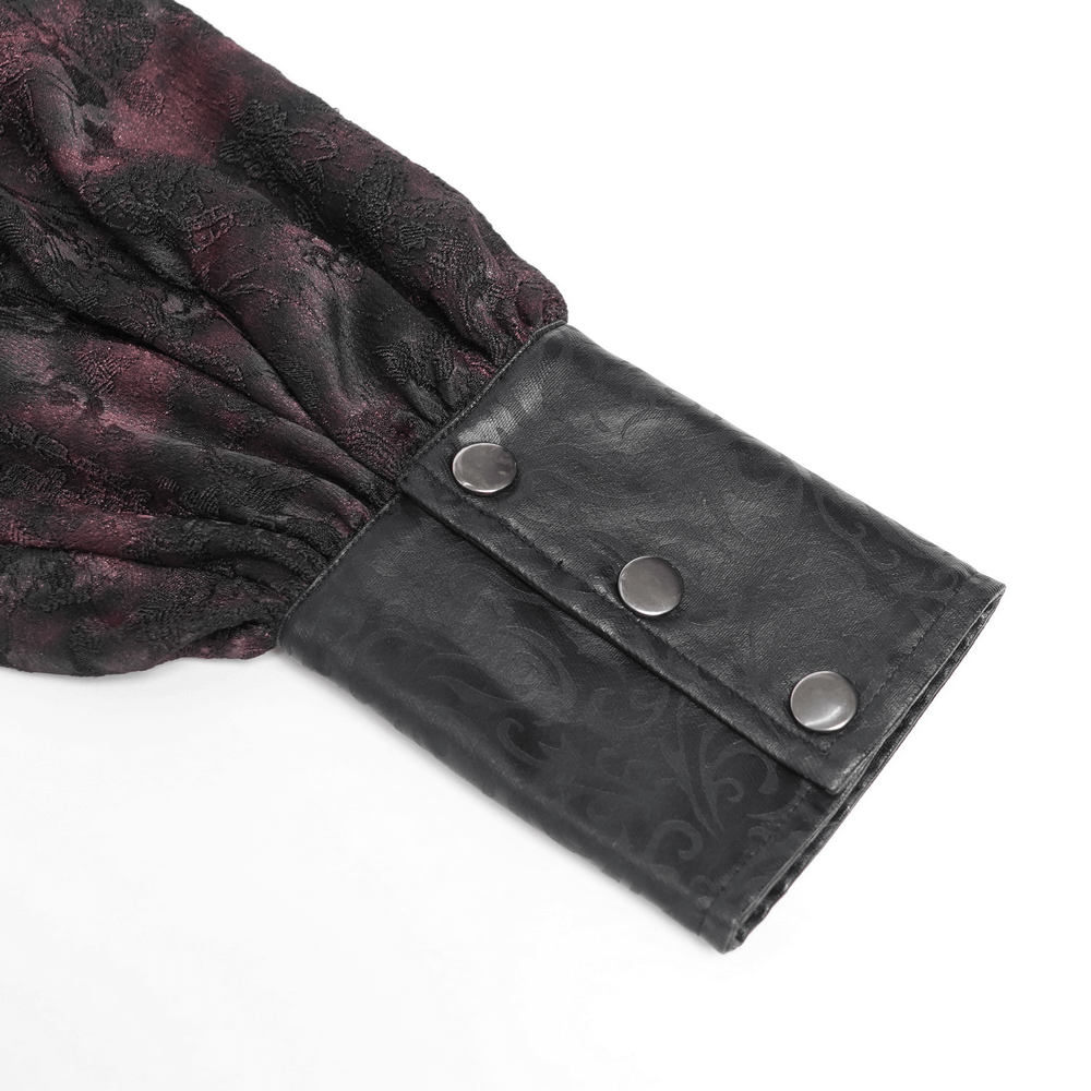 Detail of Dark Romantic Shirt with Ruffled Collar and Buttons showcasing puffed sleeve and faux leather cuff.