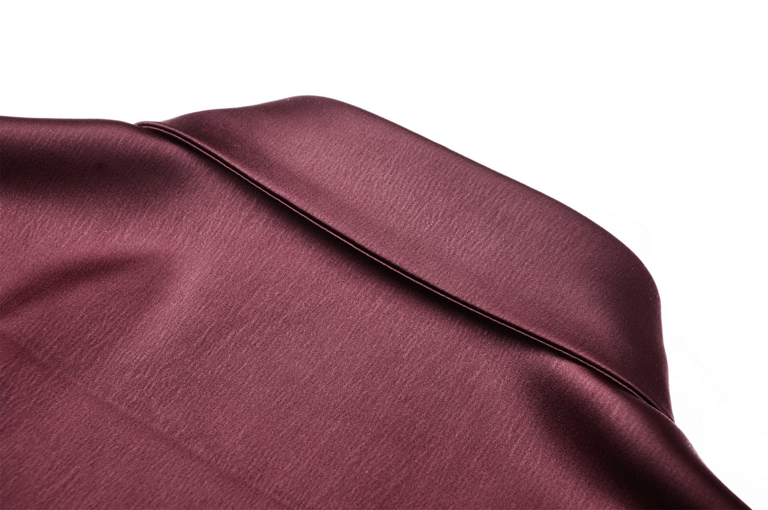 Close-up of luxurious wine red satin fabric, showcasing its smooth texture and rich color for a gothic blouse.