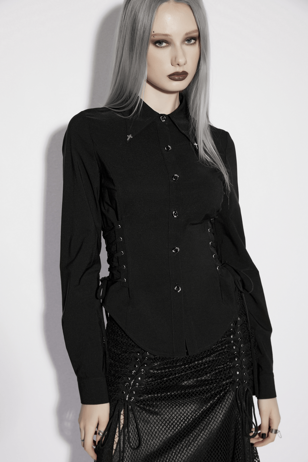 Alt Tag: Dark Stretch Slim Fit Shirt with Crosses on Collar on model, black button-down with lace-up waist panels and gothic cross collar accents