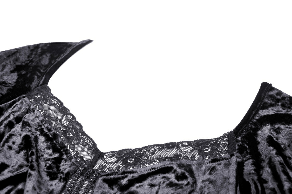 Close-up of black velveteen dress neckline with delicate lace accents, showcasing gothic elegance and style.
