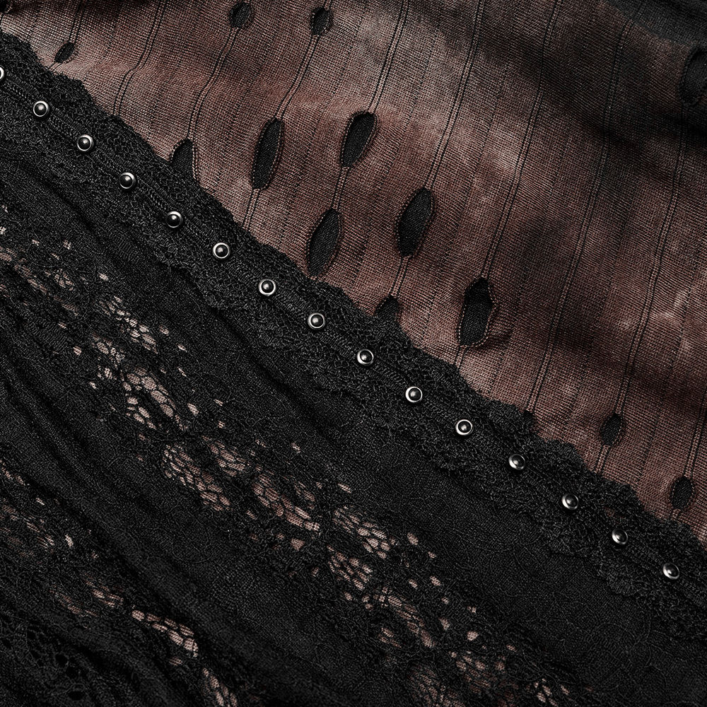 Close-up of dark wizard coat fabric showcasing lace mesh, irregular hem, and decorative rivets.