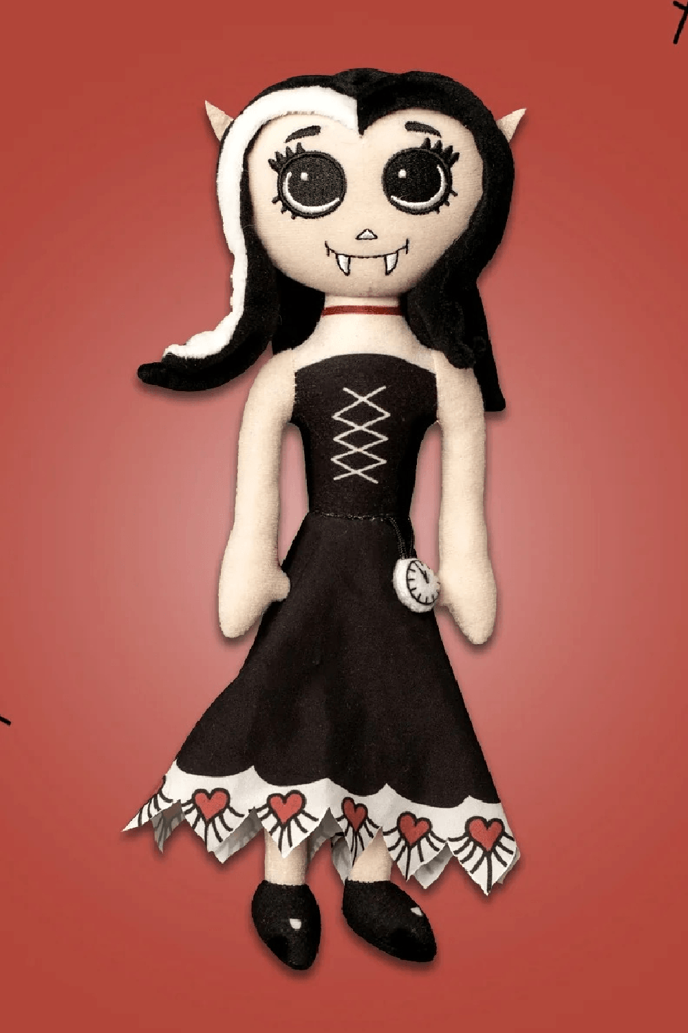 Dead Under The Bed Vampire Plush Doll Keepsake in a whimsical black dress with hearts, perfect for bedtime.
