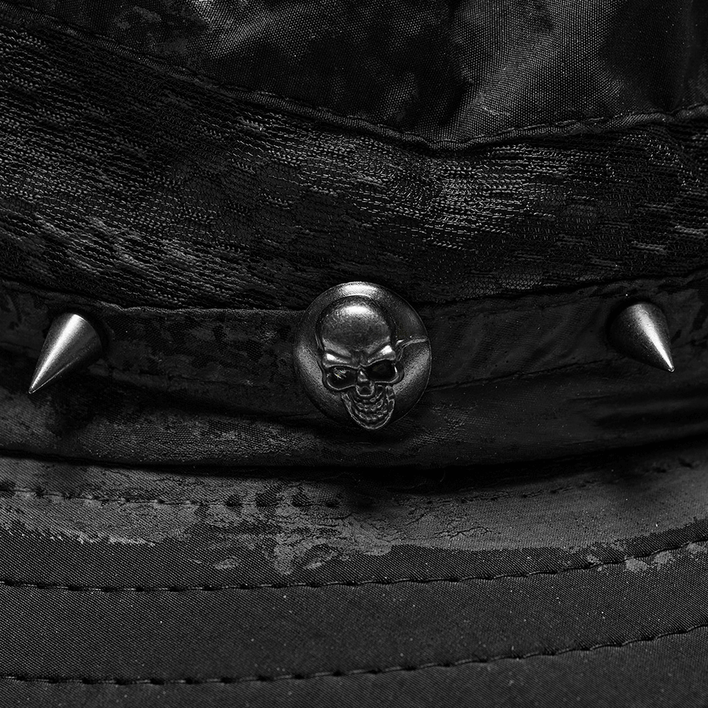 Close-up of a distressed woven hat showcasing skull detail and spikes, exuding post-apocalyptic rugged style.