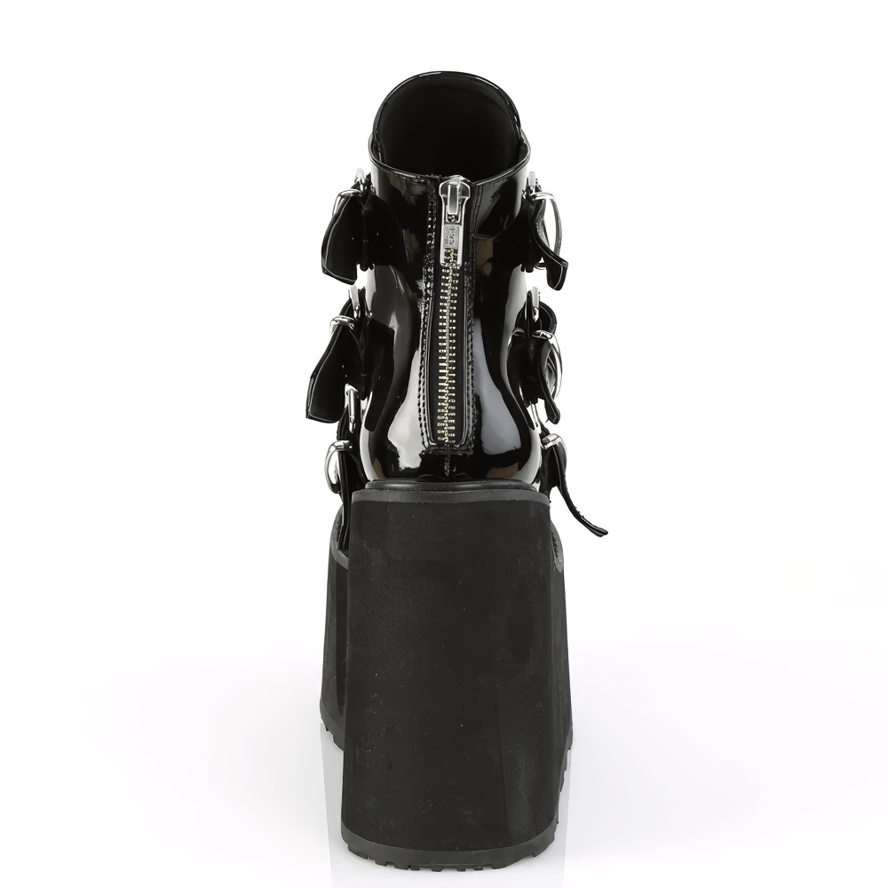 Back view of Demonia black ankle boots with triple buckles, chrome plates, and a stylish wedge platform.