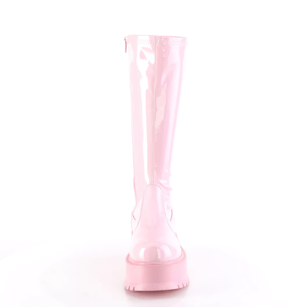 Front view of Demonia baby pink holo stretch knee-high platform boots with a shiny holographic finish.