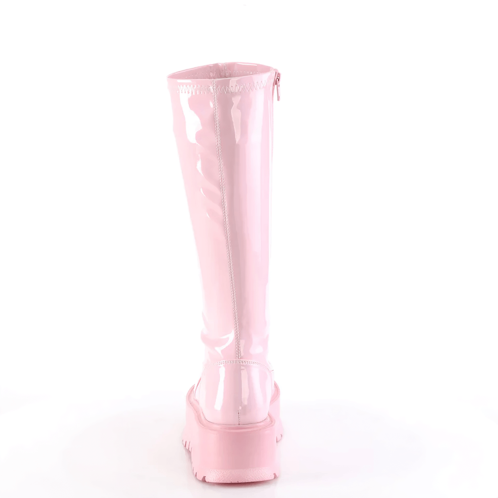 Back view of DEMONIA Baby Pink Holo Knee-High Platform Boots with shiny holographic finish and inside zip.
