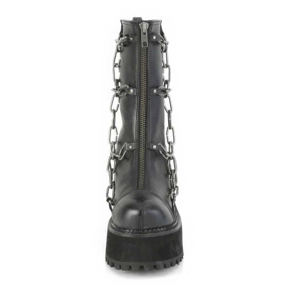 Demonia black ankle boots featuring bold block heel and striking metal chain detailing.