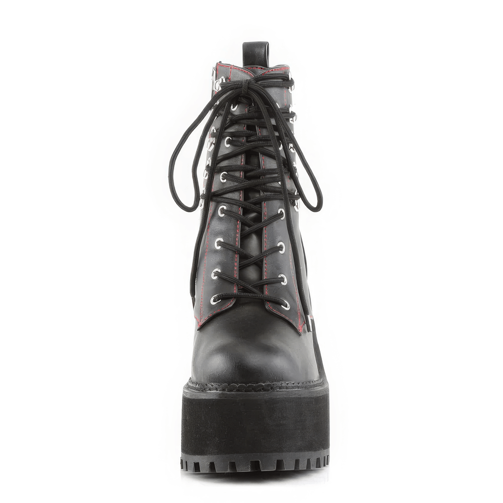 Front view of DEMONIA Black Block Heel Ankle Boots with red stitching and double D-ring laces, featuring a cleated platform.