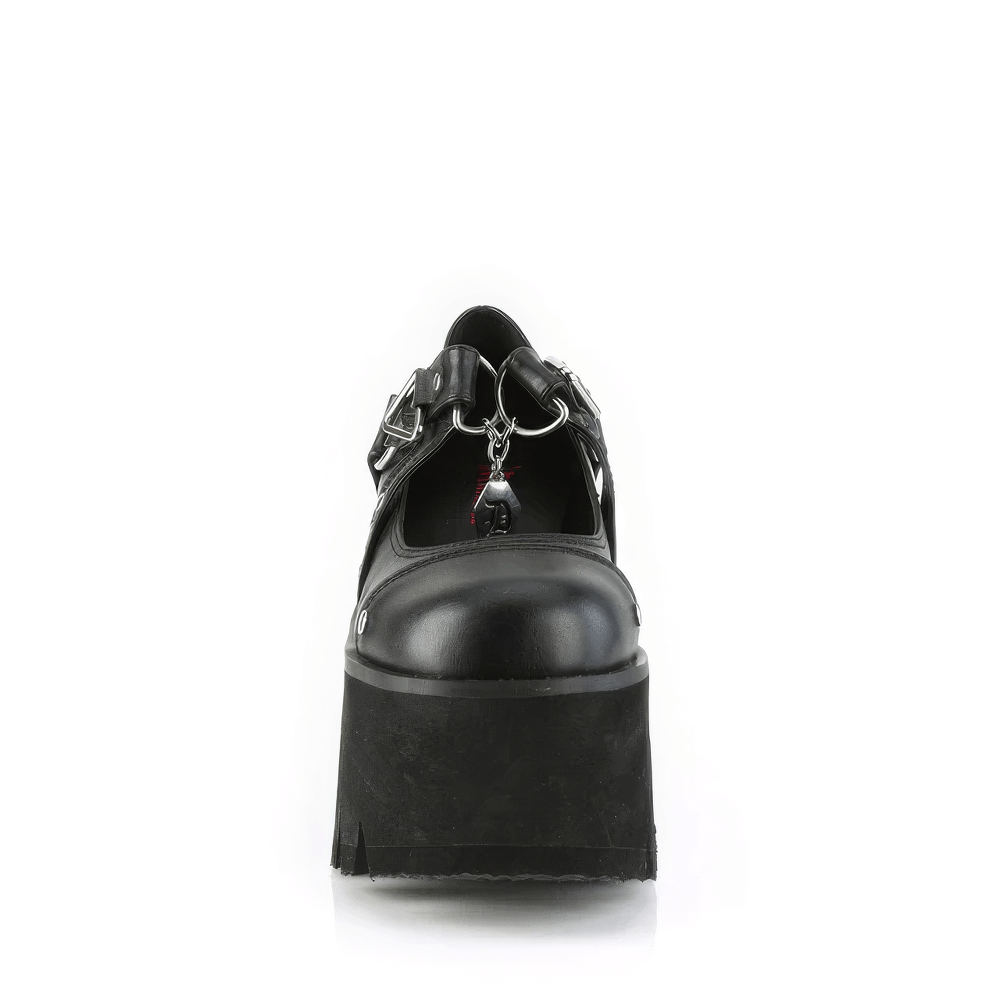 Front view of DEMONIA black chunky heel platform boots with metal accents and unique coffin-shaped charm.