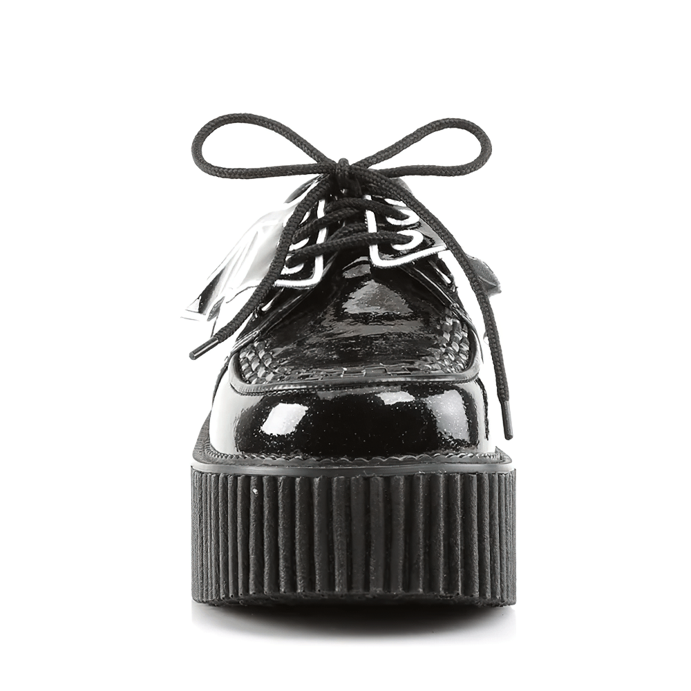 Demonia black glitter creepers with bat wings and 3-inch platform, front view showcasing edgy gothic style.