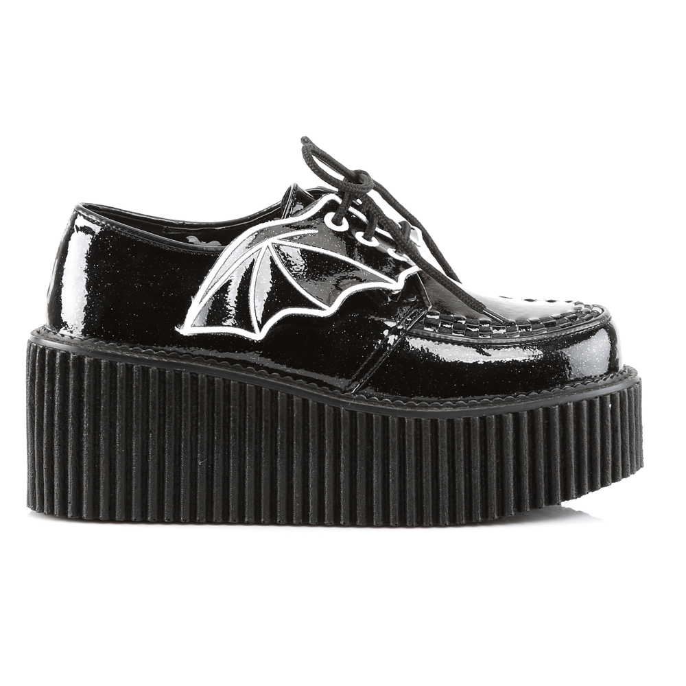 Demonia black glitter creepers shoes with detachable bat wings and a 3-inch platform for edgy gothic style.
