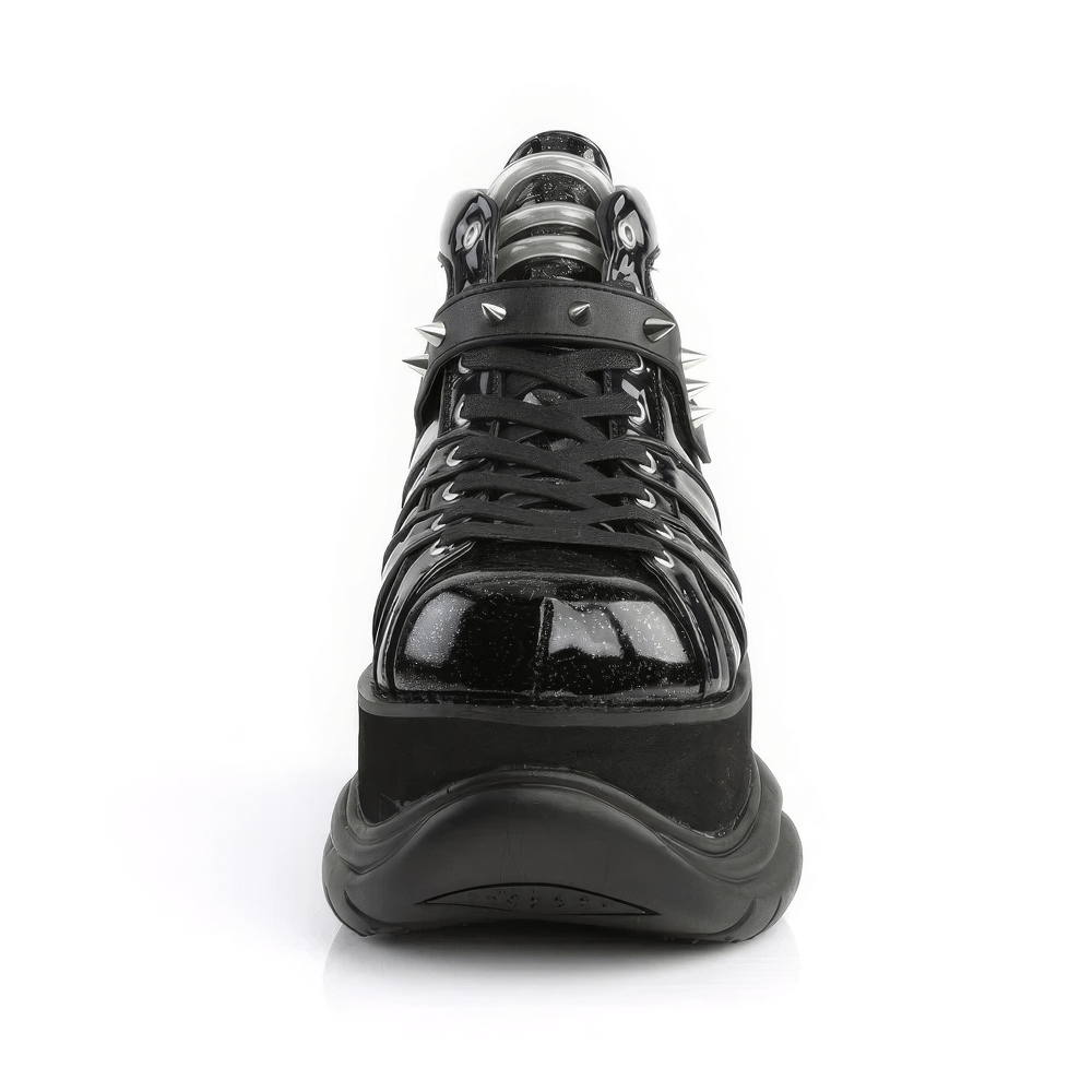 Front view of DEMONIA black glitter platform ankle boots with cone studs, showcasing a bold lace-up design.