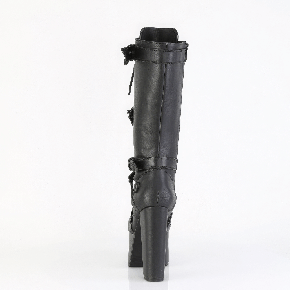 Demonia black knee-high boots showcasing harness and skull details from the side view, featuring a stylish chunky heel.